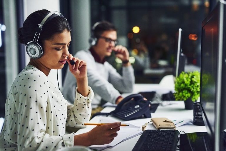 shot-of-young-call-centre-agents-working-late